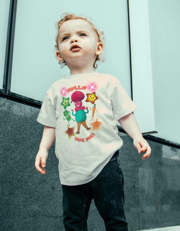 Toddler wearing a natural colour T-shirt with Mr Cutesy Myllo printed on the front