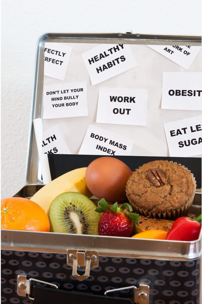 Balanced lunchbox with fruit and a biscuit inside