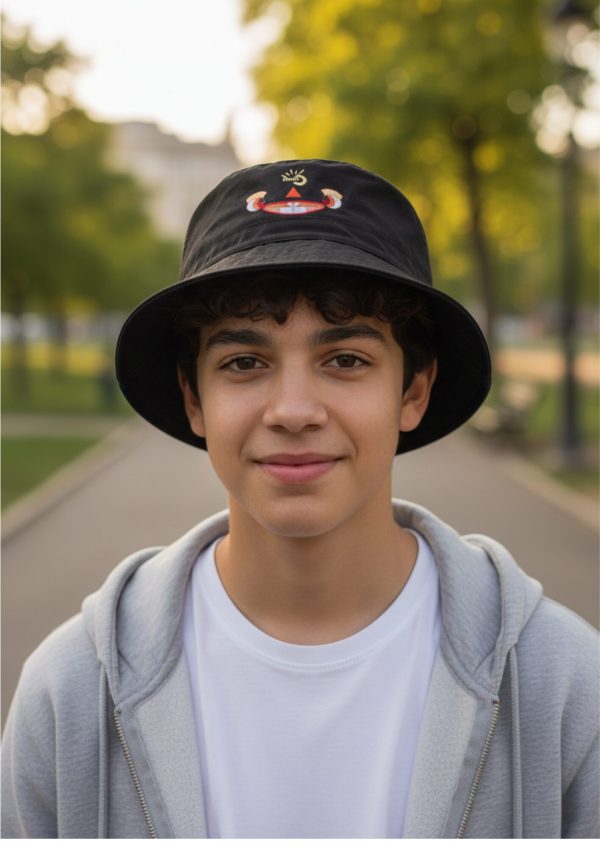 Teen boy outdoors wearing Myllo bucket hat with adjustable cord